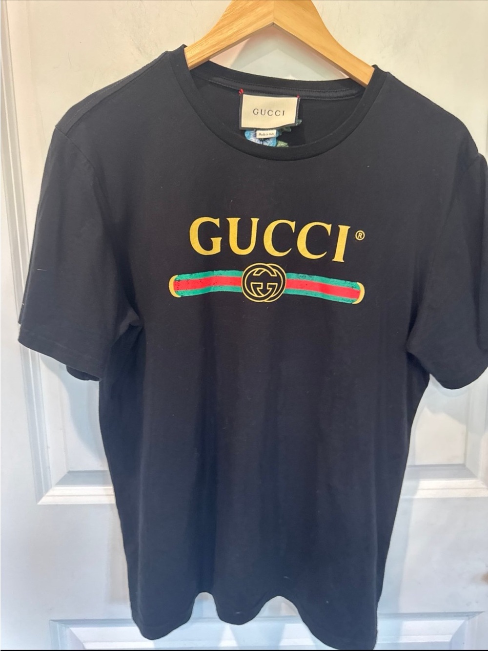 Gucci Black Tee with Gold Logo and Green-Red Stripe